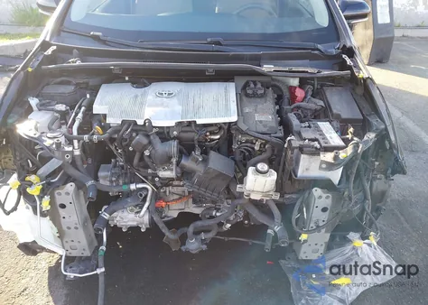 2021 Toyota Prius Le from USA, damaged, VIN JTDKAMFU3M3132231